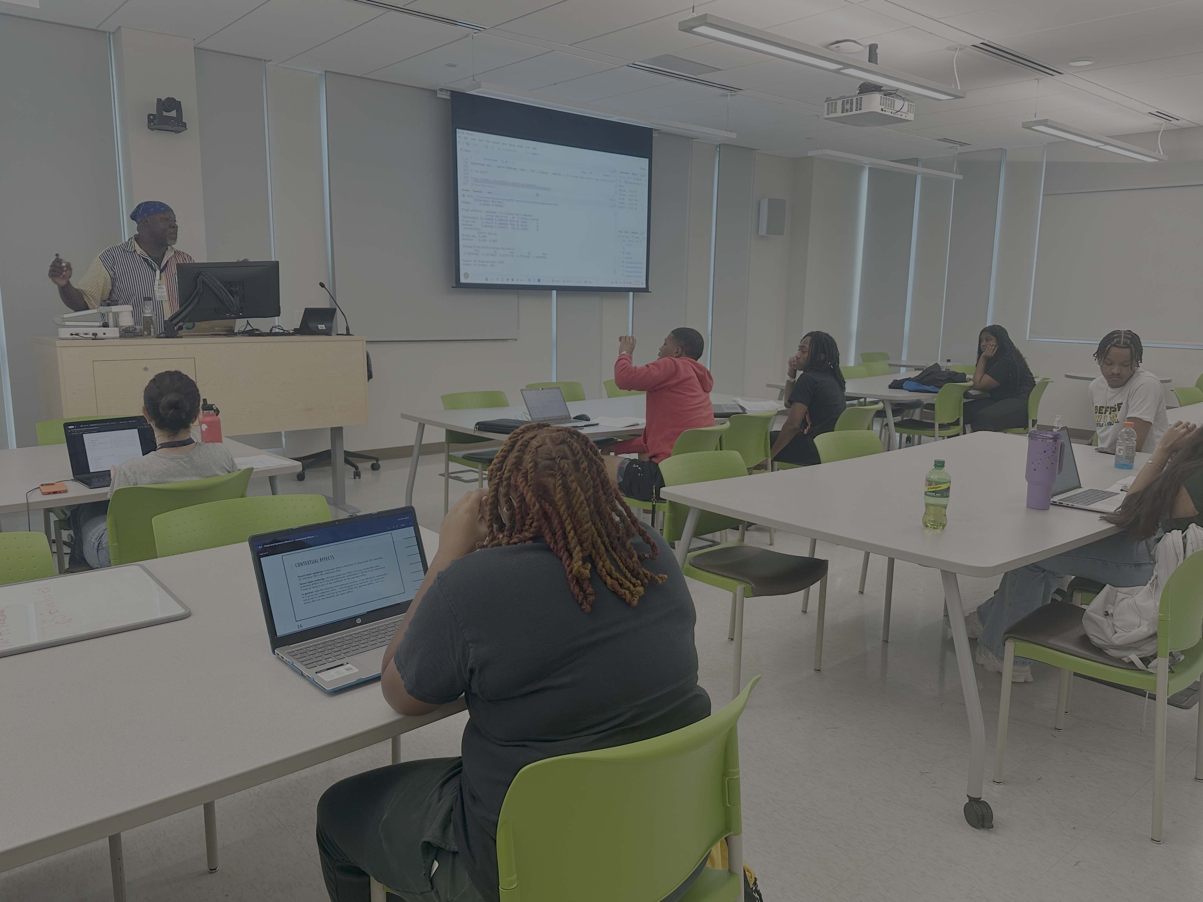 Photo shows an instructor standing in front of a class as part of an ICPSR Summer Program workshop at Norfolk State Univerrsity.